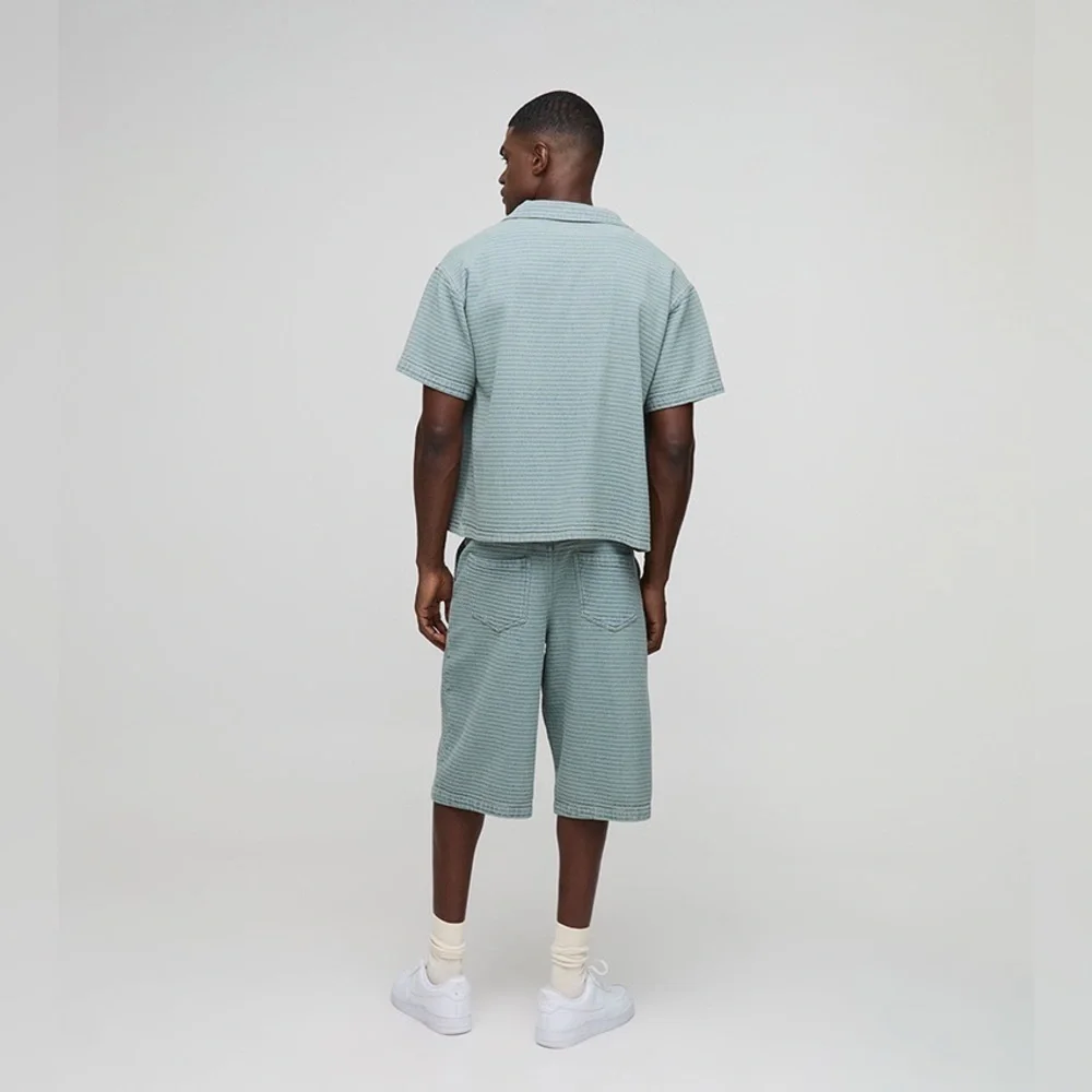 BoohooMAN Denim Textured Jorts in light blue
